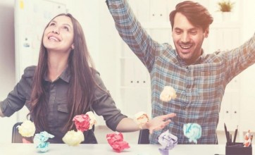 Employee playing with crumpled paper